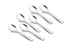 Six modern stainless steel teaspoons with tapered flat handles arranged in two rows against white background showing mirror-polished finish