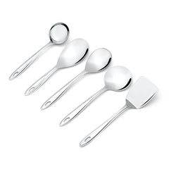 Trinity serving tools closeup featuring gravy ladle, rice spoon, vegetable server, and solid turner with oval handle design