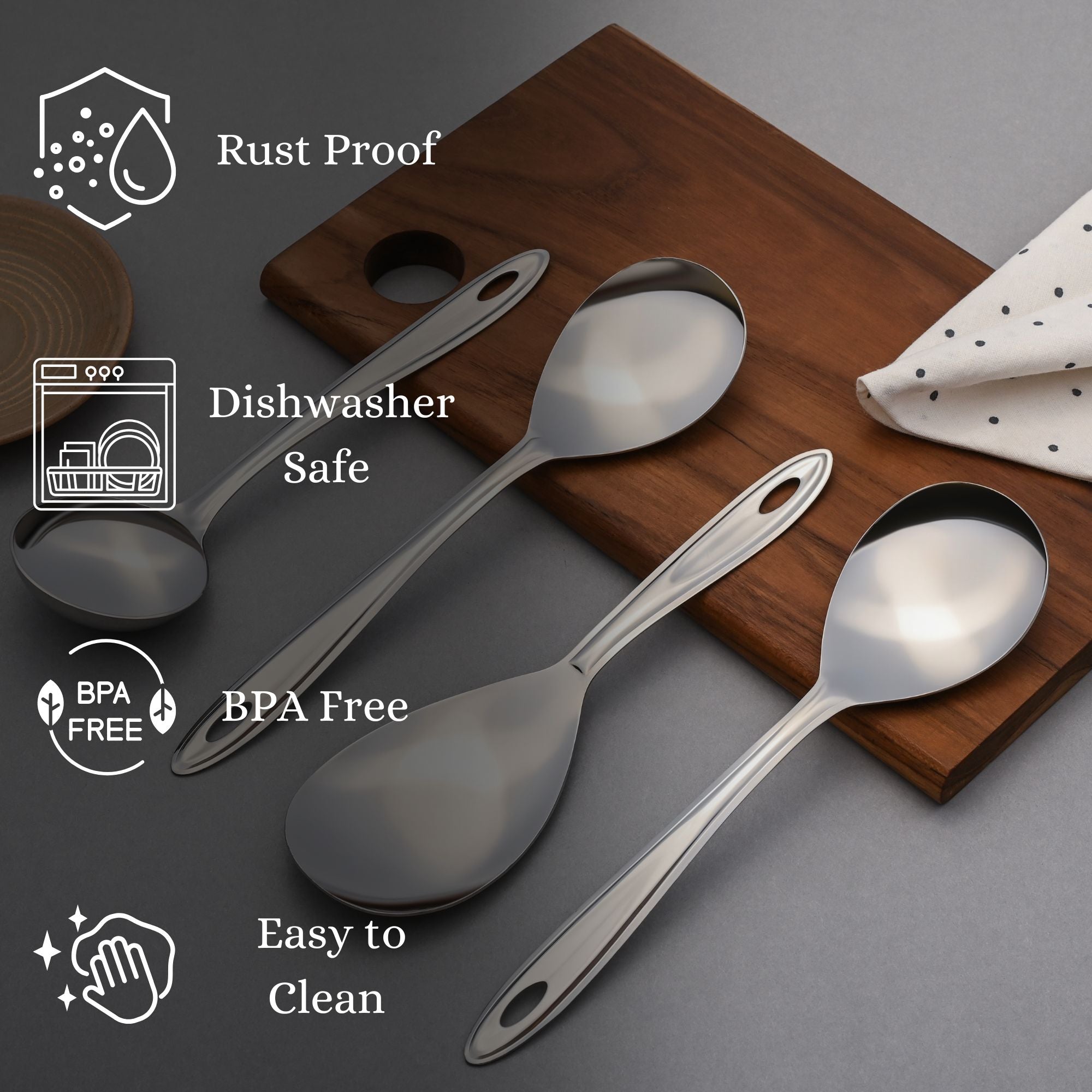 Trinity serving spoons highlighting rust-proof, dishwasher-safe, BPA-free features on wooden board with polka dot napkin accessory.